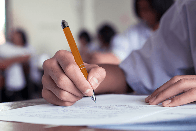 barbri_young-man-hand-taking-test_article Pdf سوالات عمومی استخدامی